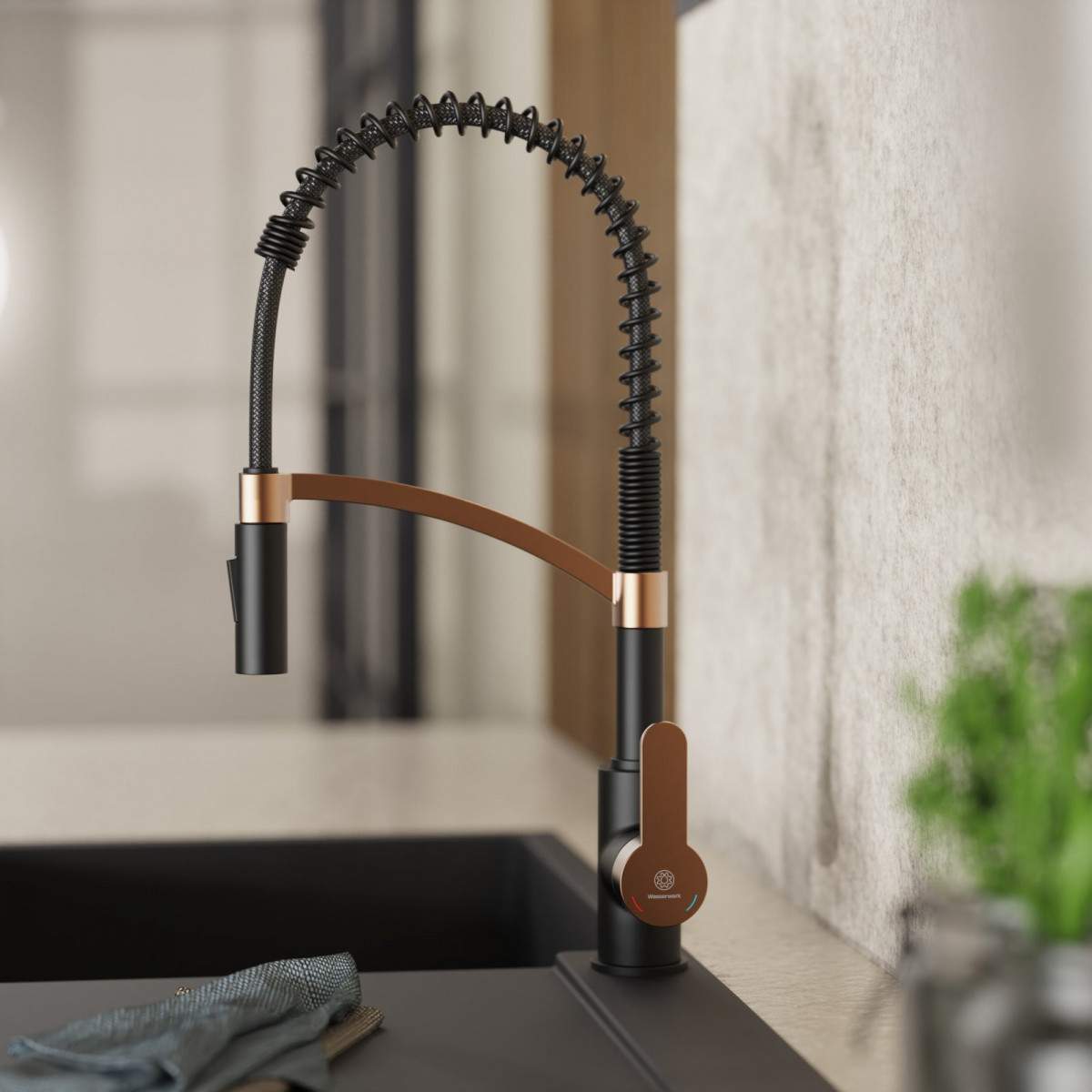 Felis Semi Pro kitchen faucet in matte black and rose gold | Wasserwerk